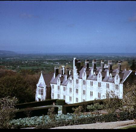 Exterior of St. Beuno's Church, looking towards Orme's Head in Wales.